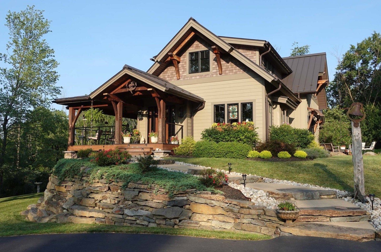 Craftsman timber frame home with stone retaining wall, Atherton California