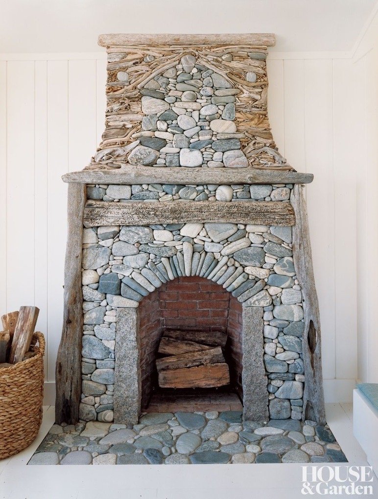 Driftwood and river stone fireplace